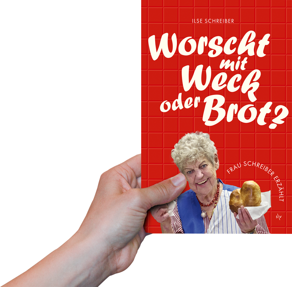Foto: Eine Hand hält das Buch "Worscht mit Weck oder Brot" hoch